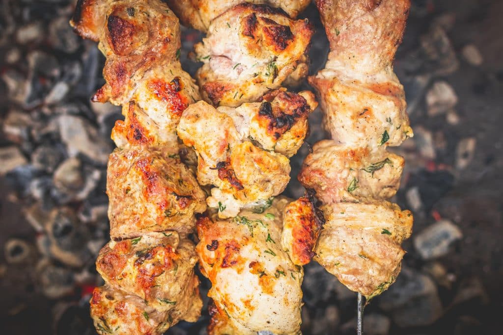 Grilled chicken skewers marinated in rosemary honey and chipotle sauce.